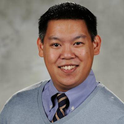 A picture of Peter L Huynh smiling