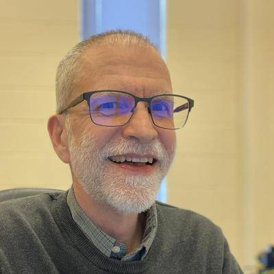 A picture of David G Taylor smiling
